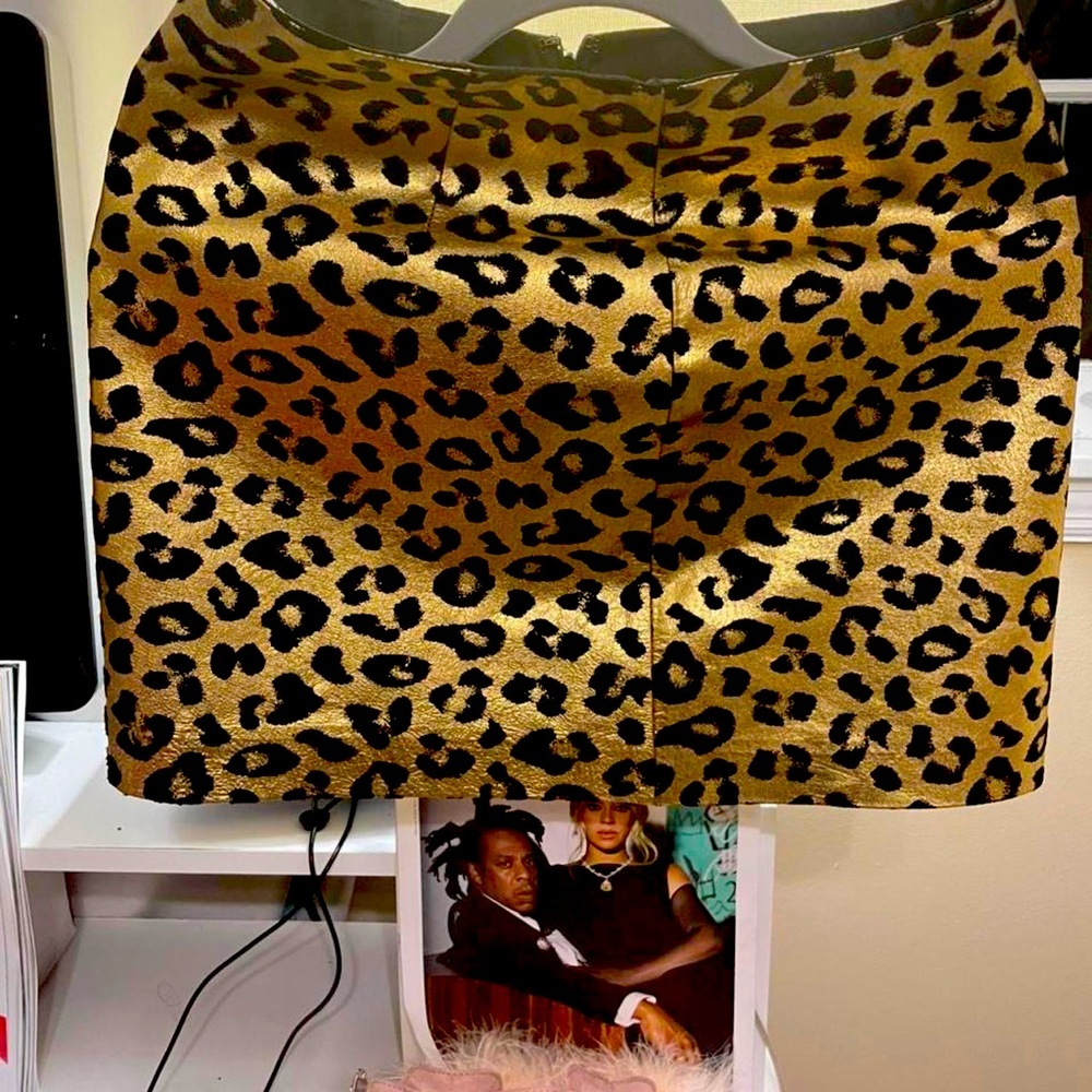 Cheetah print skirt. (Runs a little big can fit sizes 2-6.)